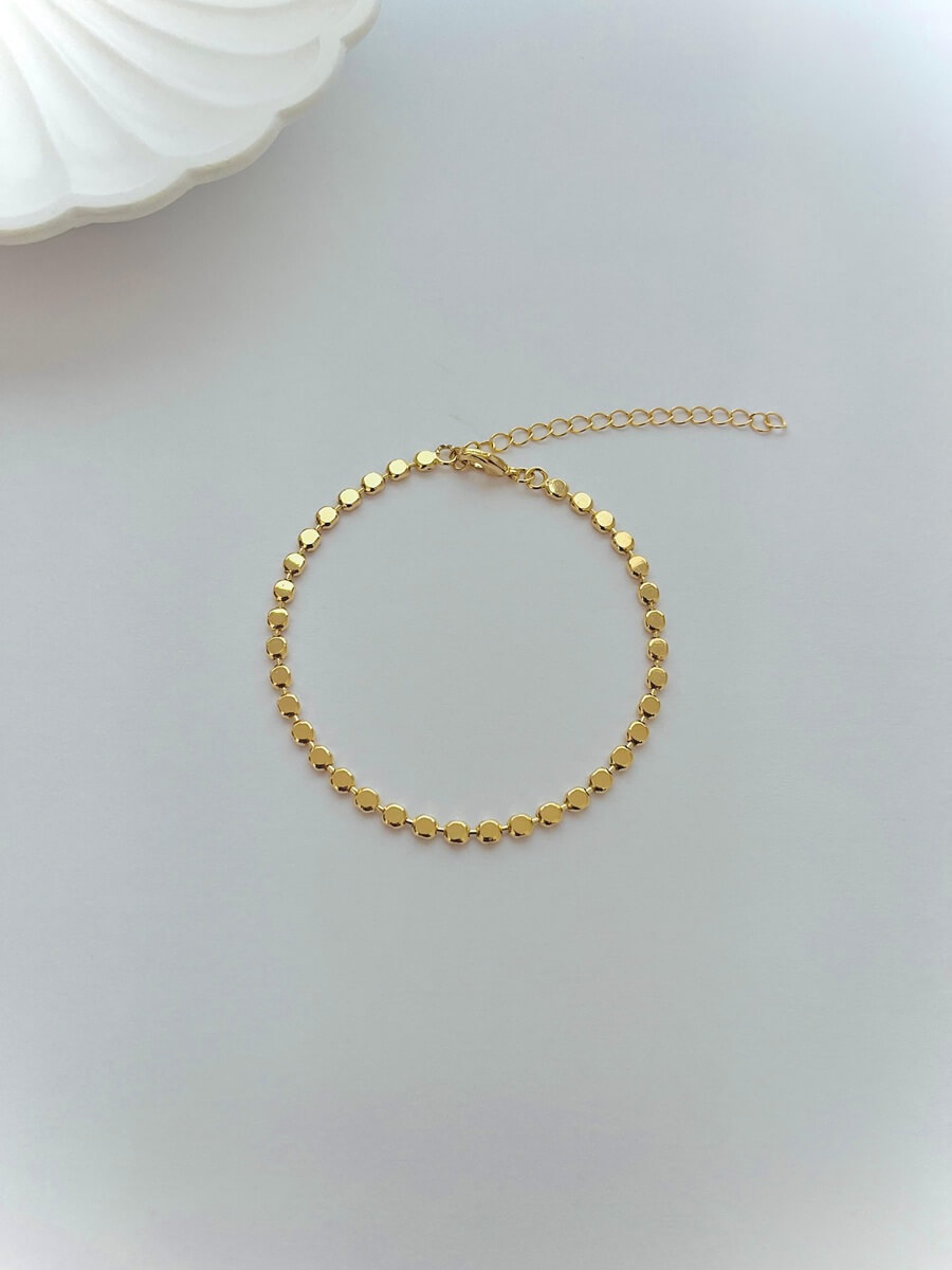 Pulseira Bolinha Achatada Banho 18K/ Ródio Branco